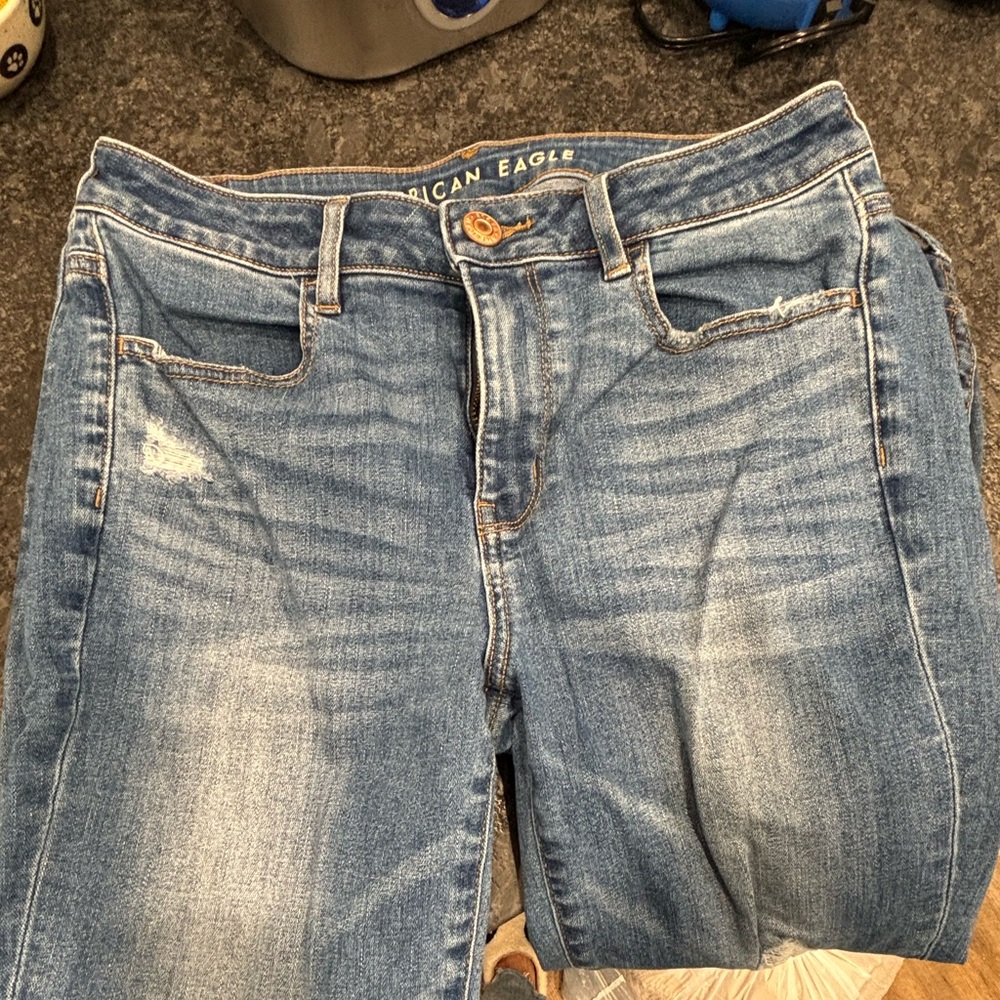 American Eagle size10 distressed super stretch jeans